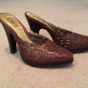 Carlos Leather woven high heeled slides.